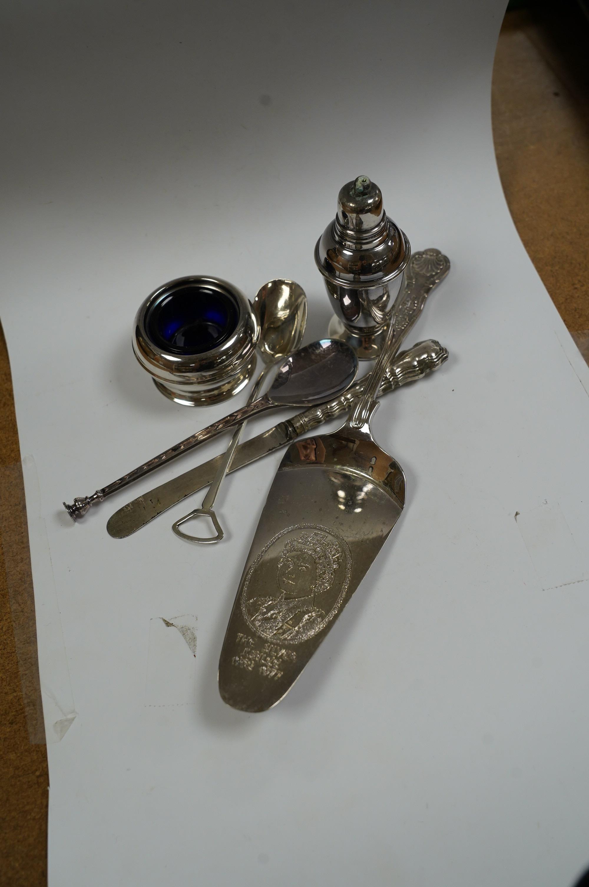 A small group of assorted teaspoons, condiment spoons, small servers, etc. including a Millennium seal top spoon by A. E. Jones Ltd and a Victorian shell bowl ladle by Jehoiada Alsop Rhodes and a silver thimble together